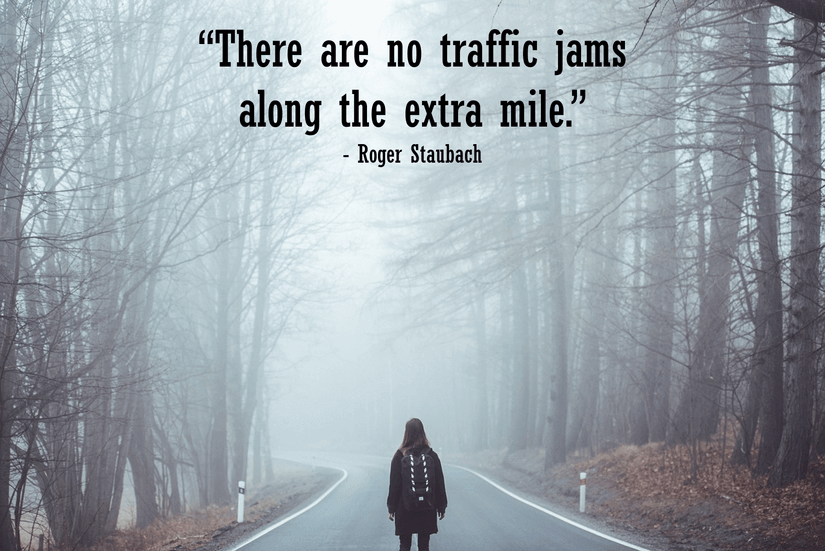 Image of a person on a foggy road with a quote from Roger Staubach